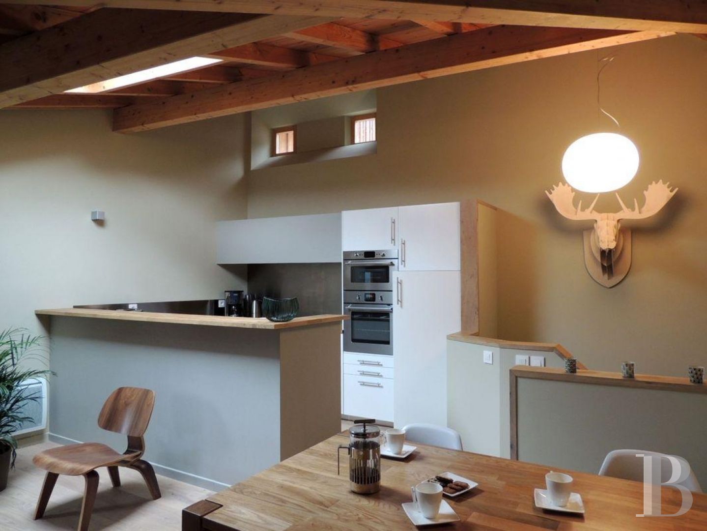A former priory bathed in sunlight and surrounded by snowy mountain tops,  to the south of Briançon in the Hautes-Alpes - photo  n°21
