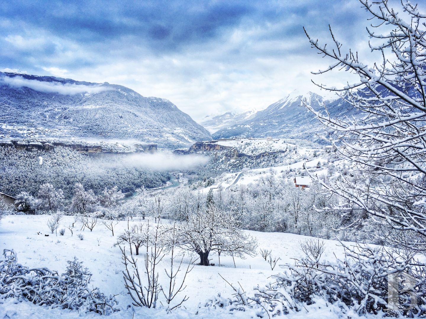 A former priory bathed in sunlight and surrounded by snowy mountain tops,  to the south of Briançon in the Hautes-Alpes - photo  n°4