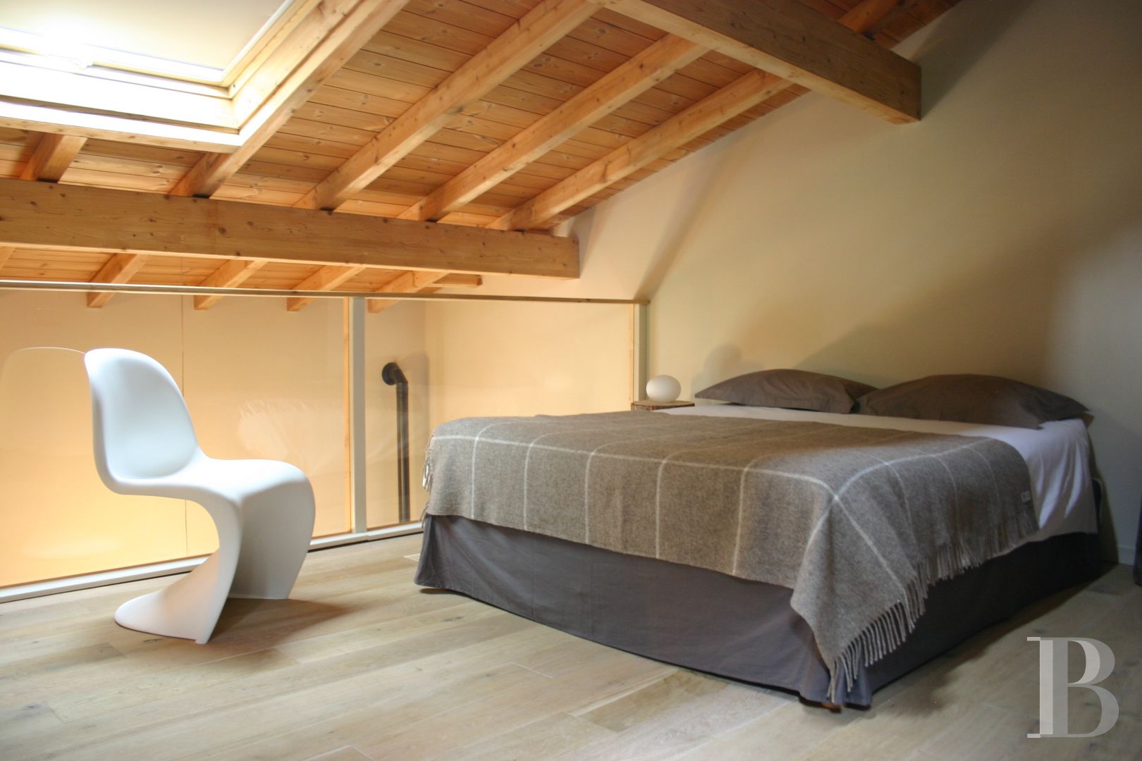 A former priory bathed in sunlight and surrounded by snowy mountain tops,  to the south of Briançon in the Hautes-Alpes - photo  n°16
