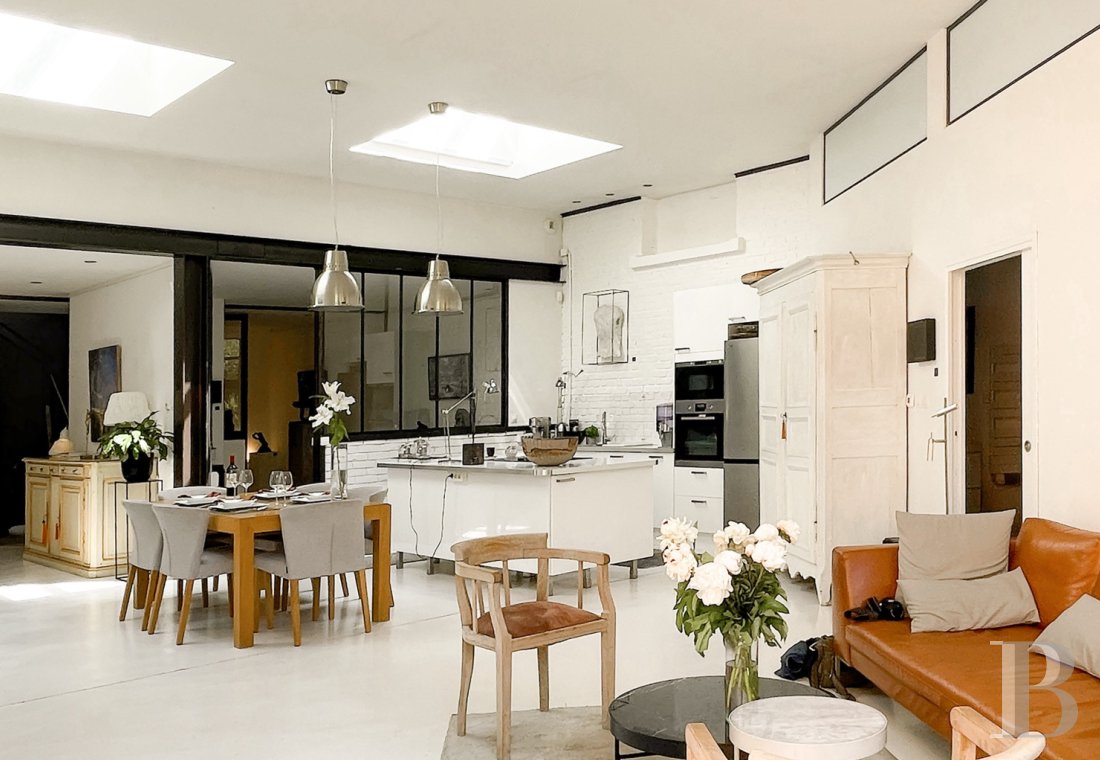 À Roubaix, au cœur d’un site industriel, une ancienne teinturerie transformée en maison-loft avec jardin - photo  n°5