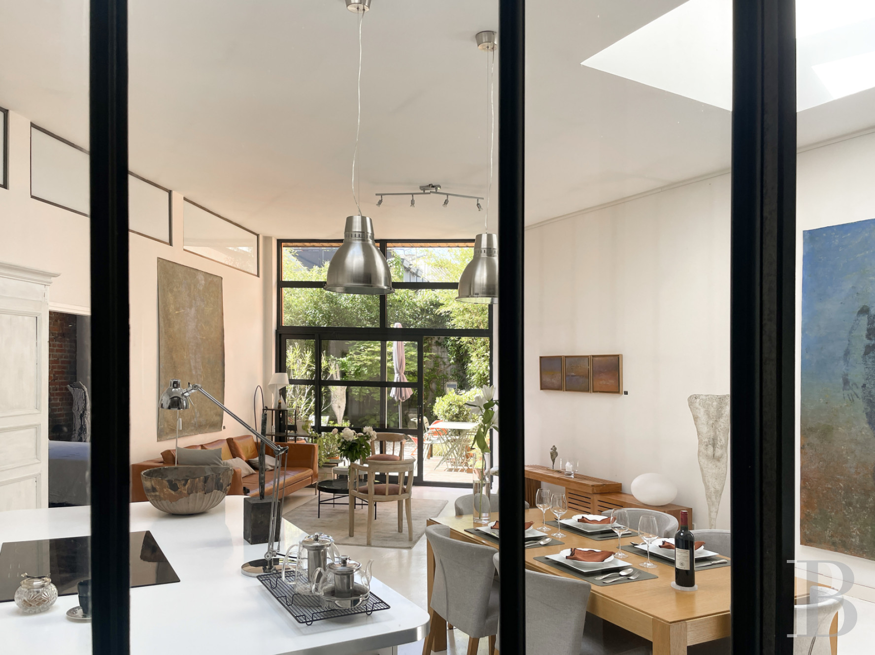 A former dye works transformed into a loft-style house with a garden in the heart of an industrial site in Roubaix - photo  n°19