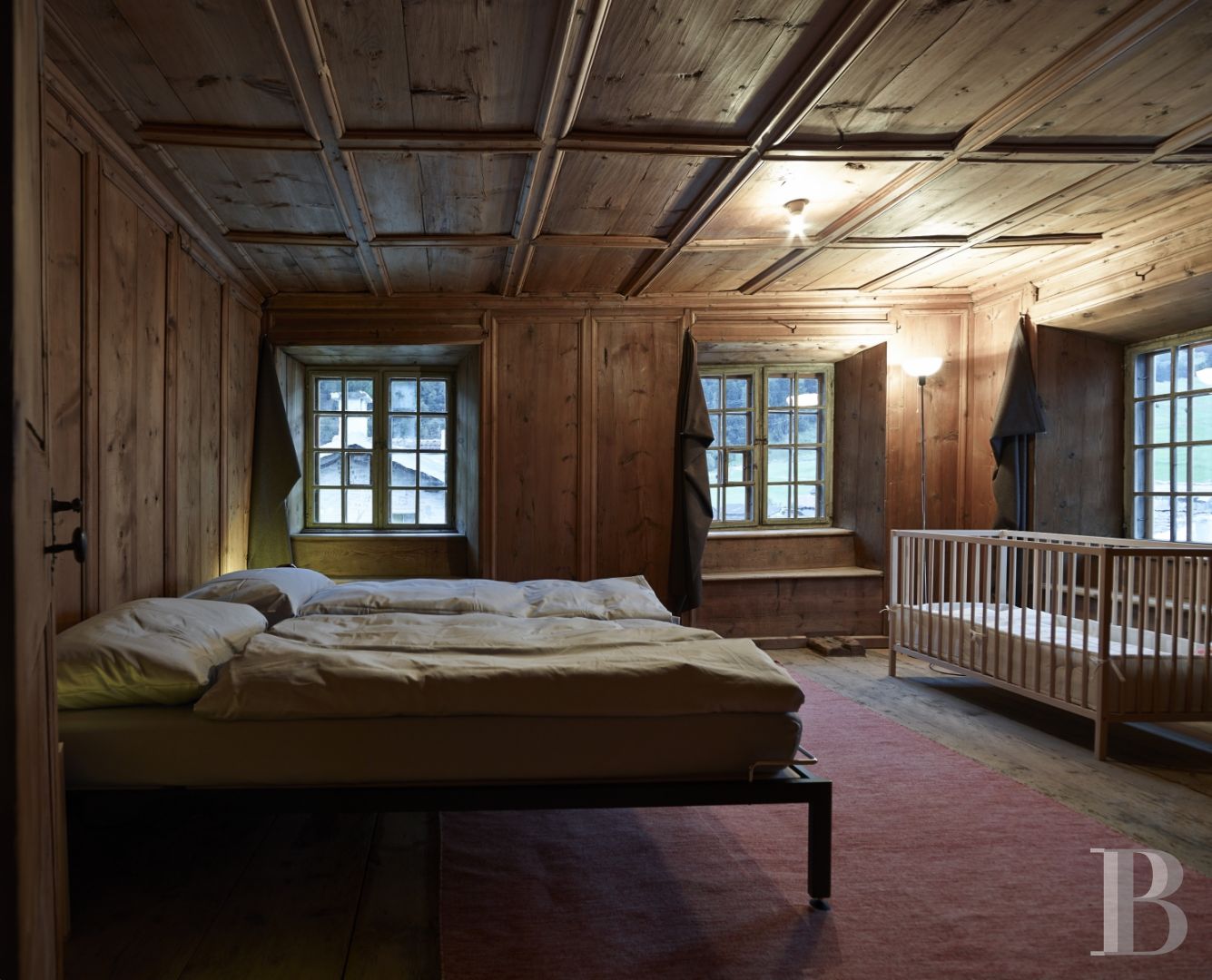 In Switzerland, in the canton of Graubünden, a baroque house and its tower in the heart of a mountain village - photo  n°11