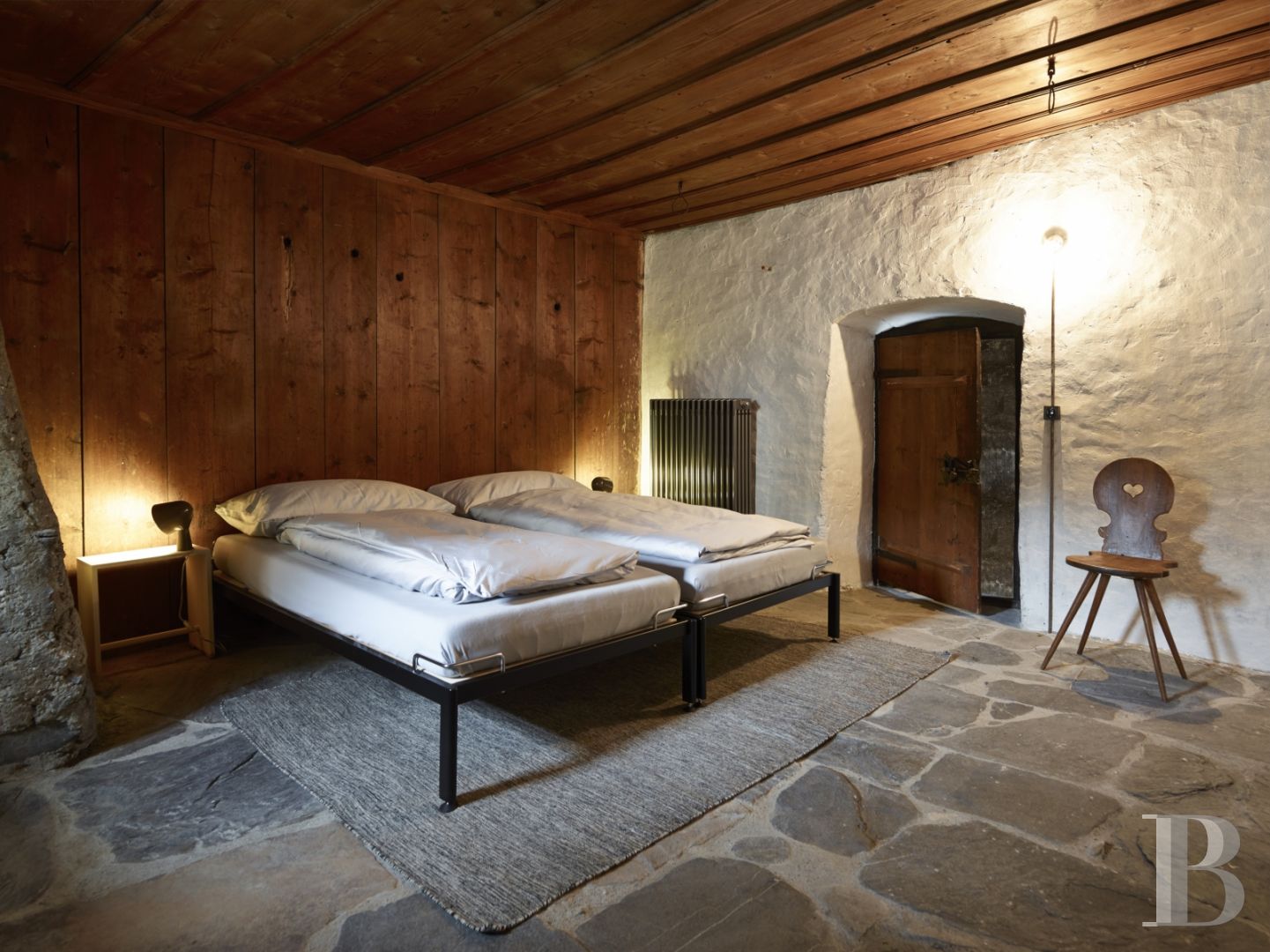 In Switzerland, in the canton of Graubünden, a baroque house and its tower in the heart of a mountain village - photo  n°5