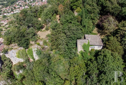 rhones-alps - A house with a converted old tower and remnants of an 11th-century chateau, looking down over a valley in France’s beautiful Bugey province between Lyon and Geneva
