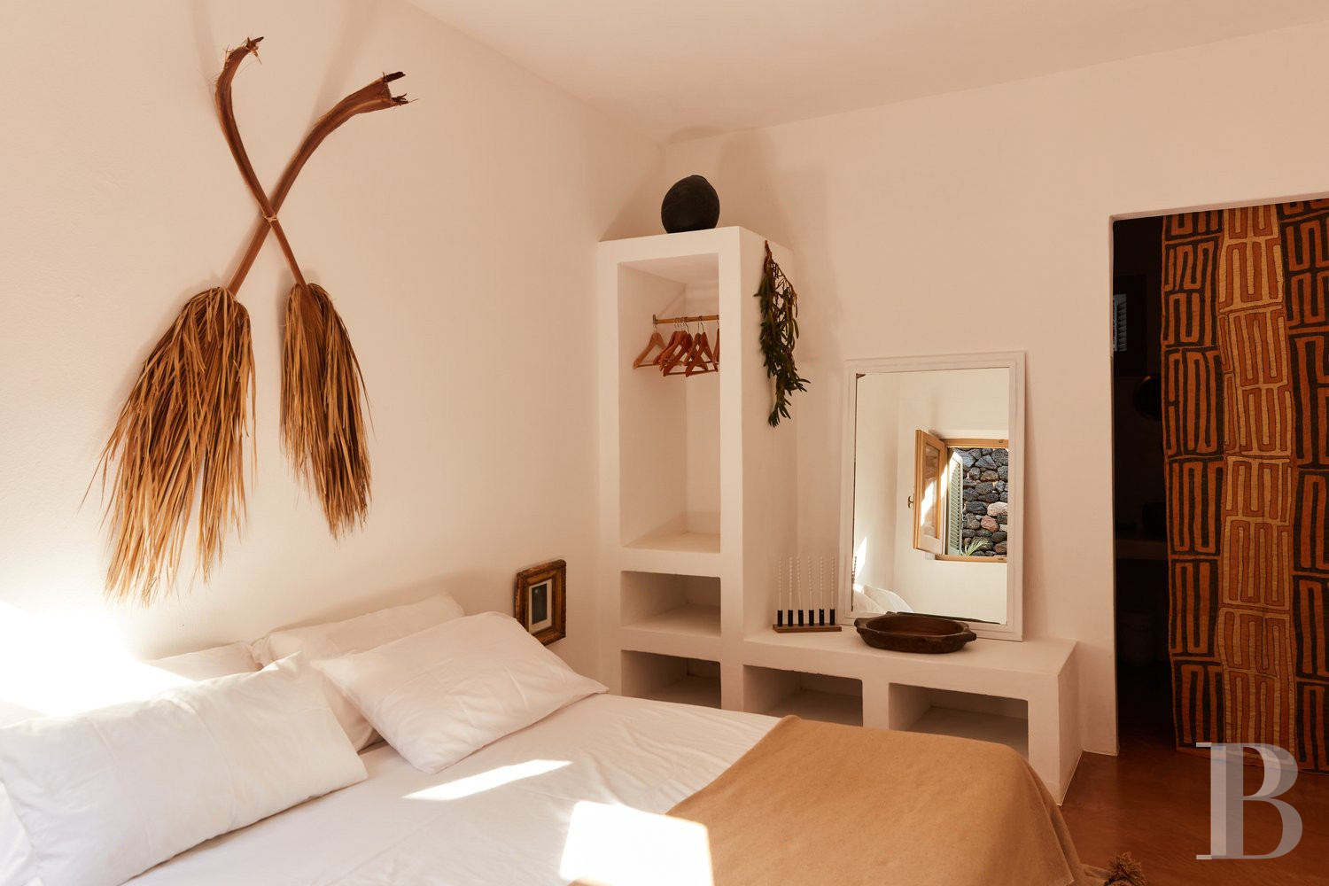 Sur l’île de Pantellaria, entre la Sicile et les côtes tunisiennes, un hameau de maisons traditionnelles en pierre de lave - photo  n°37