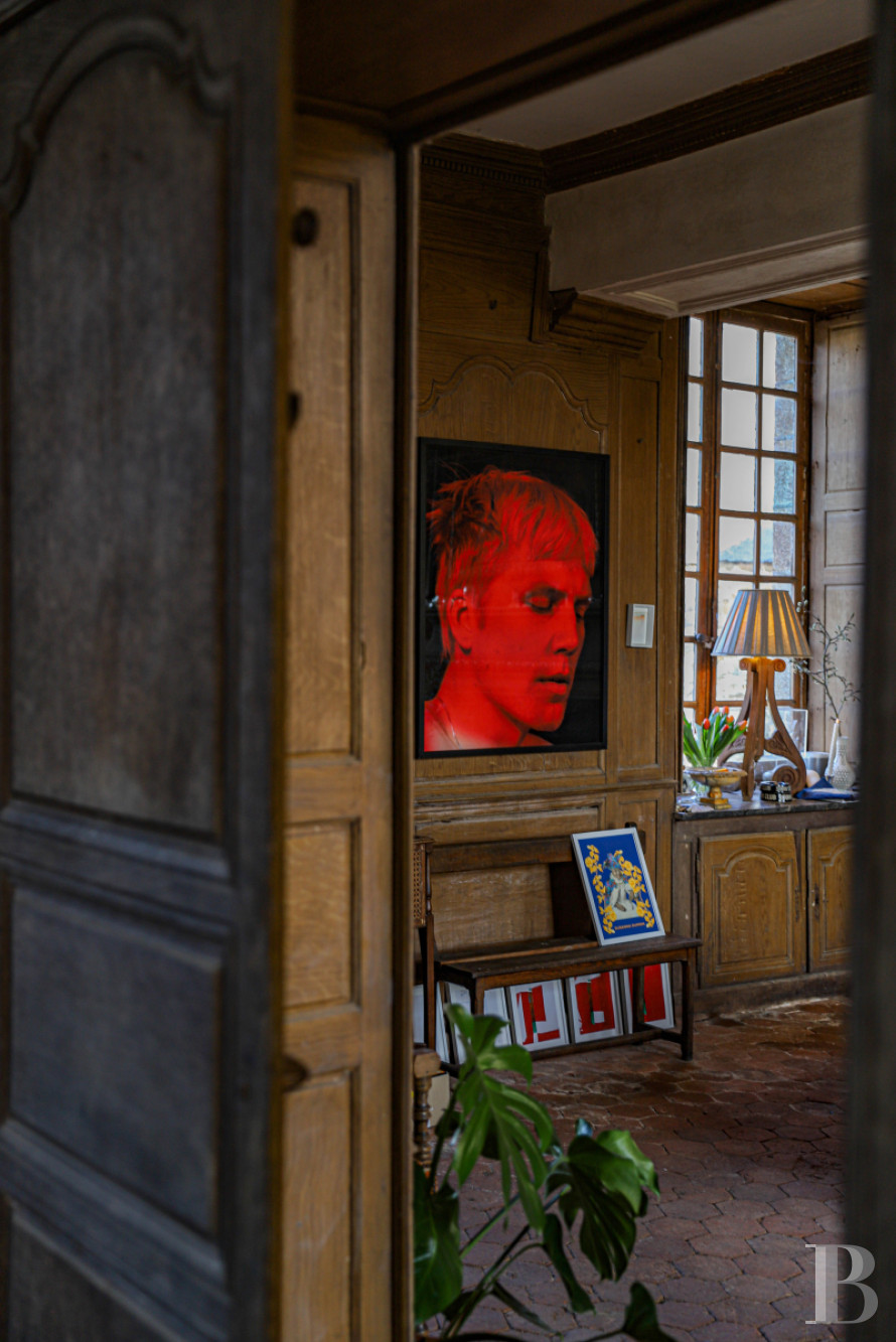 En Mayenne, au nord de la ville éponyme, un château du 17e siècle ceinturé de douves en eau - photo  n°16