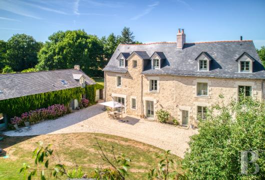 pays-de-loire - Dans un domaine privé aux environs de Nantes,  un manoir du 15e s. restauré, sa longère aménagée et son parc de 1,4 ha