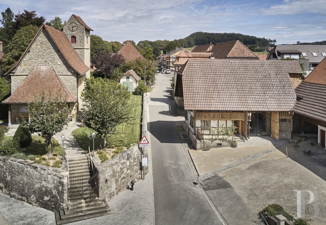 An old 19th century peasants' house in Vinelz, in the Canton of Bern - photo  n°5