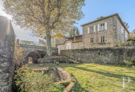 rhones-alps - A 16th-century manor house and its heated swimming pool, in the foothills overlooking the Ardèche River, upstream from the town of Aubenas