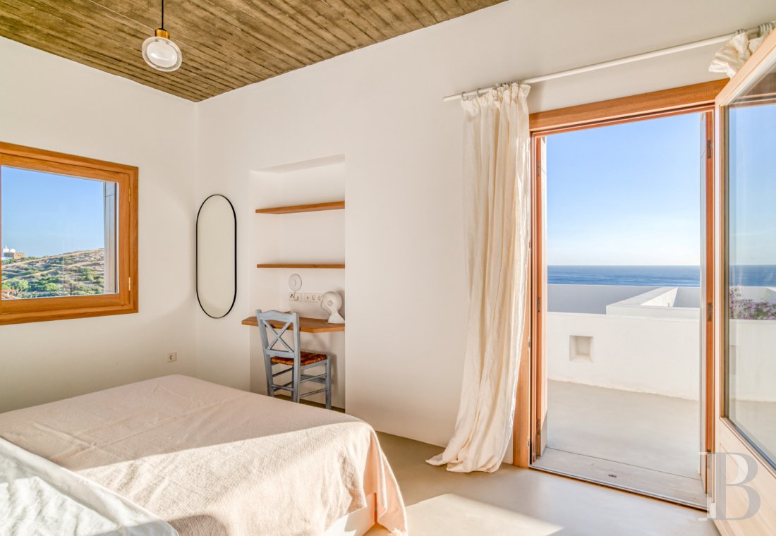 A group of houses between sky and sea on Ios in the Cyclades - photo  n°29