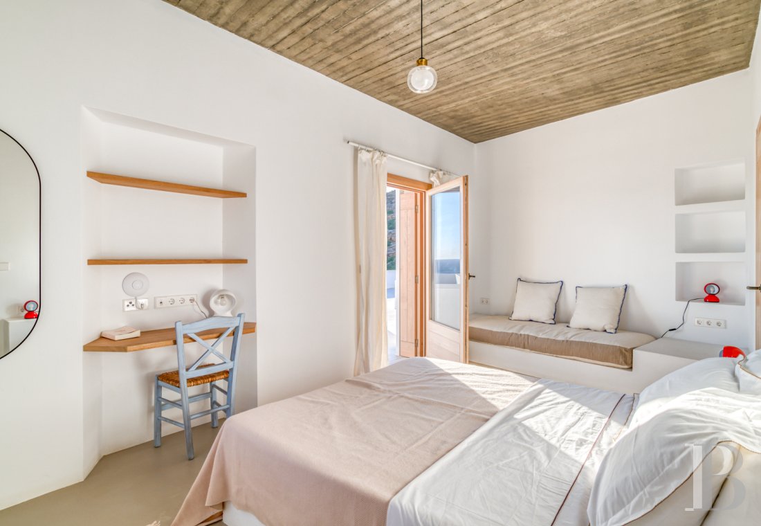 A group of houses between sky and sea on Ios in the Cyclades - photo  n°31