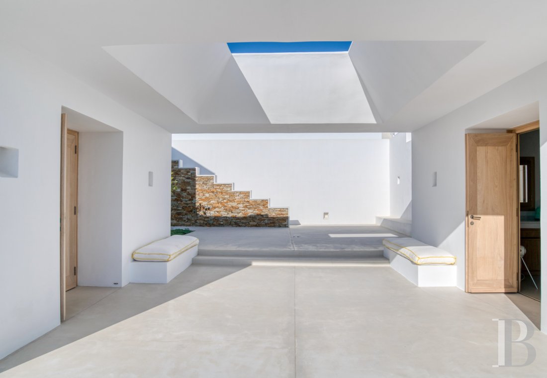 A group of houses between sky and sea on Ios in the Cyclades - photo  n°19