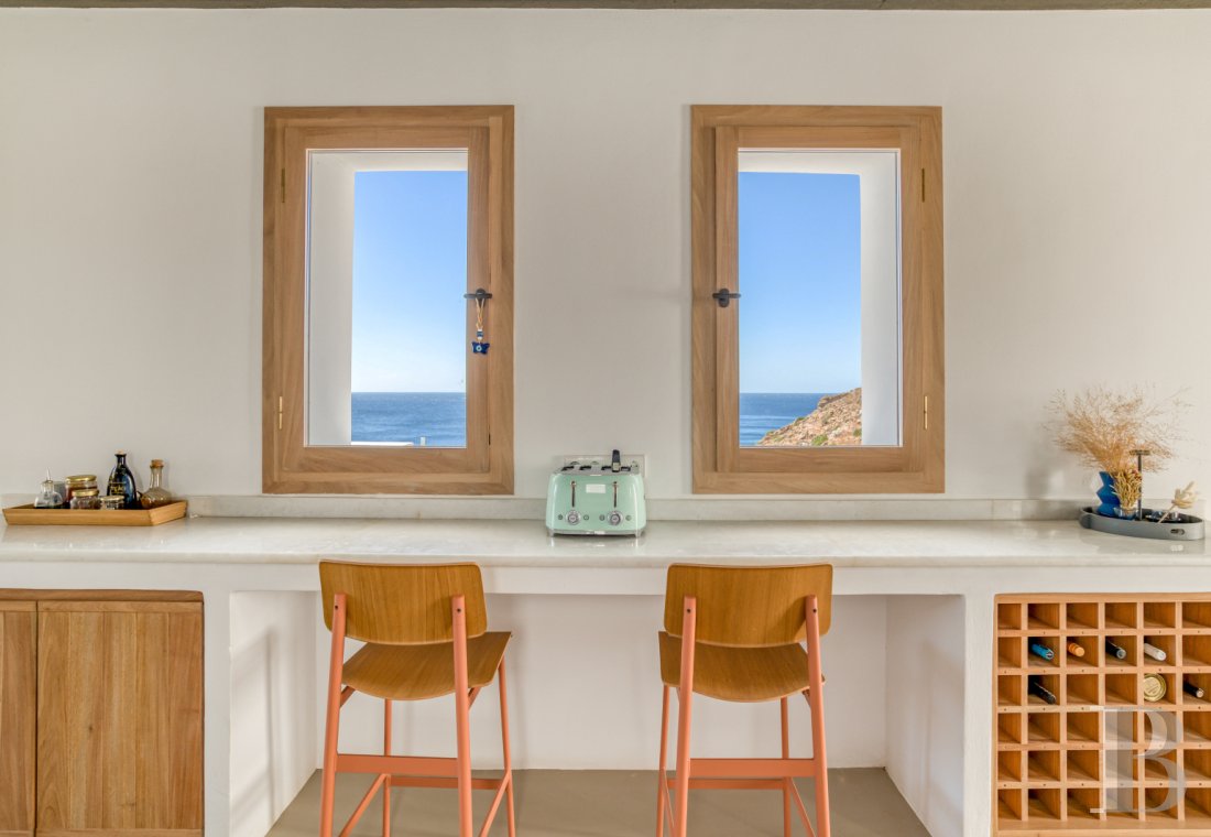 A group of houses between sky and sea on Ios in the Cyclades - photo  n°22