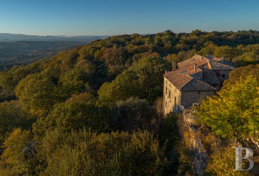 languedoc-roussillon - An ancient fortified castle, its gîte and 12 ha of grounds in a hamlet  between the Cèze and Ardèche rivers, with a commanding view of the Cévennes 
