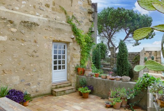 languedoc-roussillon - A late-16th-century house listed as a historical monument with a garden and  secondary dwelling at the top of a quaint village in France’s Hérault department