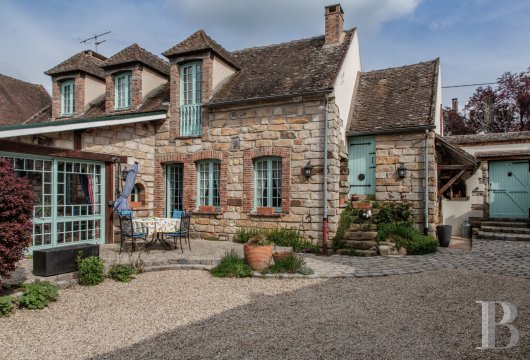 burgundy - In a Burgundy village, only a little over an hour outside of Paris,  a cluster of houses and outbuildings surrounded by a bucolic garden