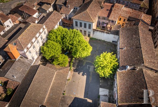 midi-pyrenees - A group of 19th-century buildings with a chapel and interior courtyard,  located in a town within the Quercy blanc region, between Toulouse and Agen