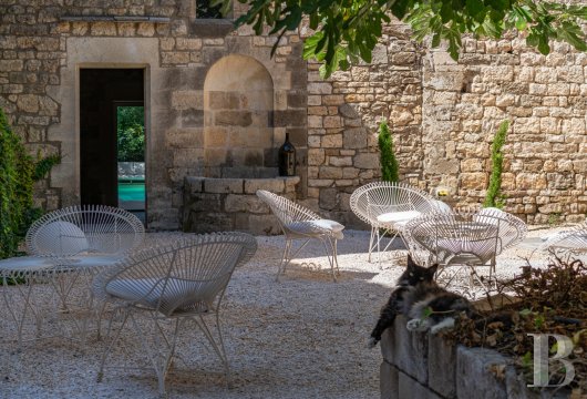 A village château dating back to the 12th century between Nîmes and Uzès in the Gard - photo  n°2