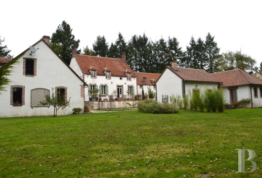 center-val-de-loire - An 18th-century manor house and its renovated private dwellings  at the bottom of a valley in the Centre-Val de Loire region