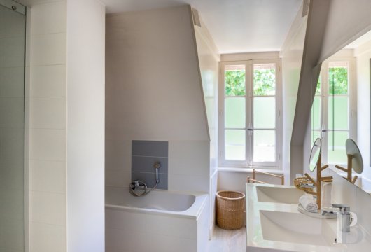 A manor house surrounded parkland and crossed by the River Sauldre in Romorantin, in the Sologne region - photo  n°25