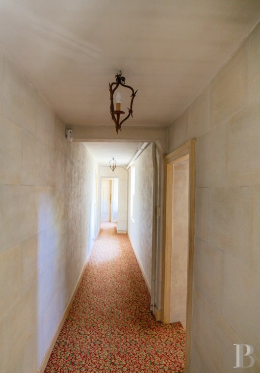 A manor house surrounded parkland and crossed by the River Sauldre in Romorantin, in the Sologne region - photo  n°15