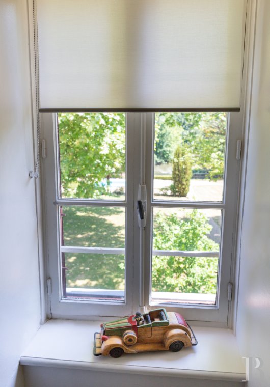 A manor house surrounded parkland and crossed by the River Sauldre in Romorantin, in the Sologne region - photo  n°21