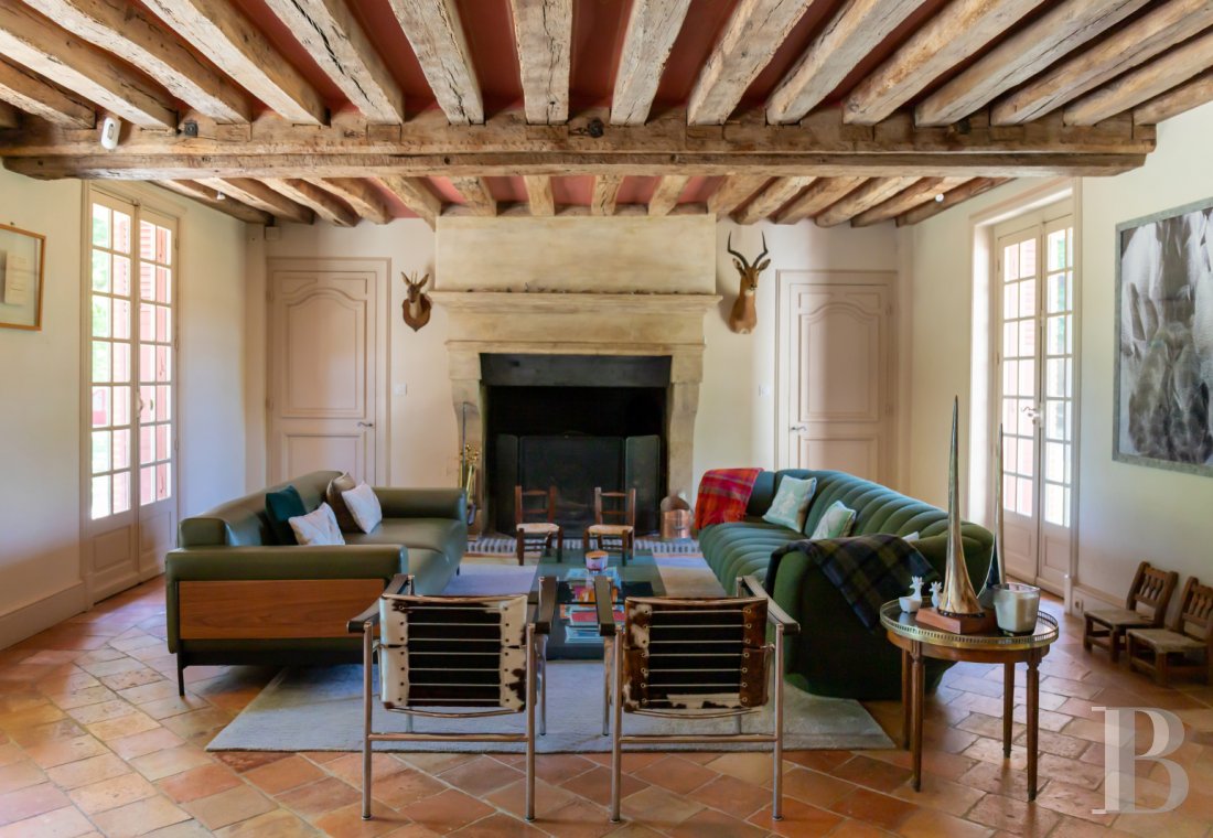 A manor house surrounded parkland and crossed by the River Sauldre in Romorantin, in the Sologne region - photo  n°10