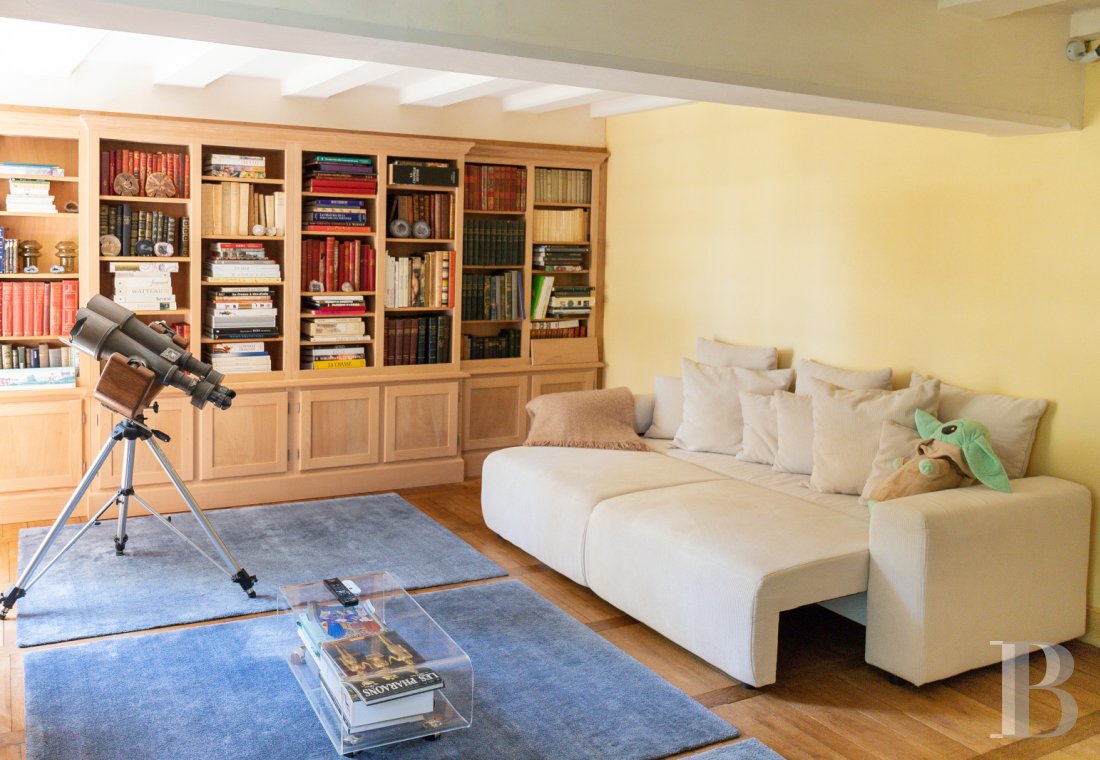 A manor house surrounded parkland and crossed by the River Sauldre in Romorantin, in the Sologne region - photo  n°34