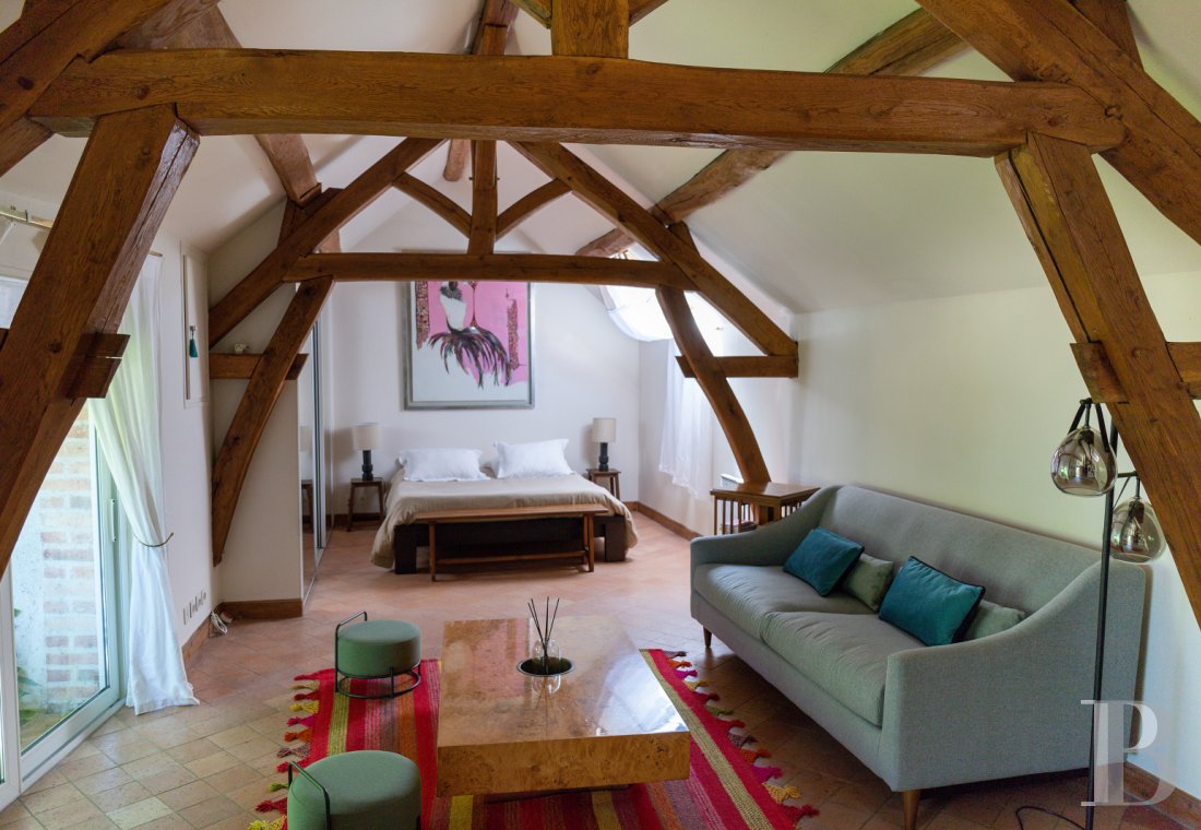 A manor house surrounded parkland and crossed by the River Sauldre in Romorantin, in the Sologne region - photo  n°35