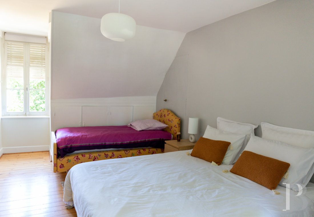 A manor house surrounded parkland and crossed by the River Sauldre in Romorantin, in the Sologne region - photo  n°19