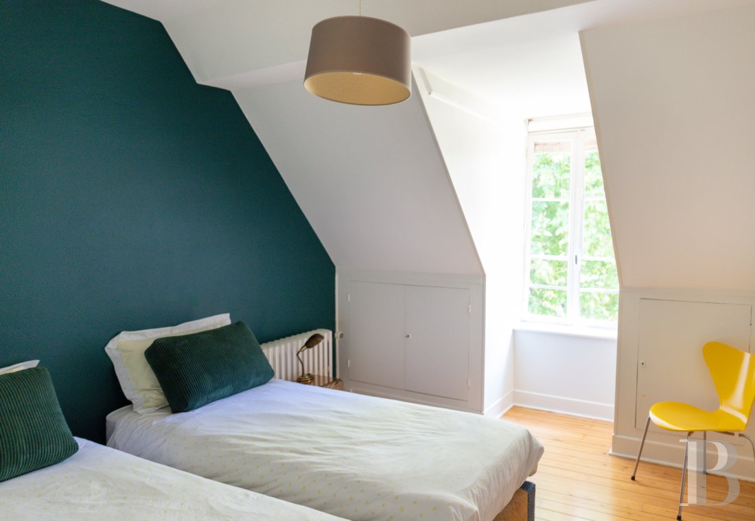 A manor house surrounded parkland and crossed by the River Sauldre in Romorantin, in the Sologne region - photo  n°23