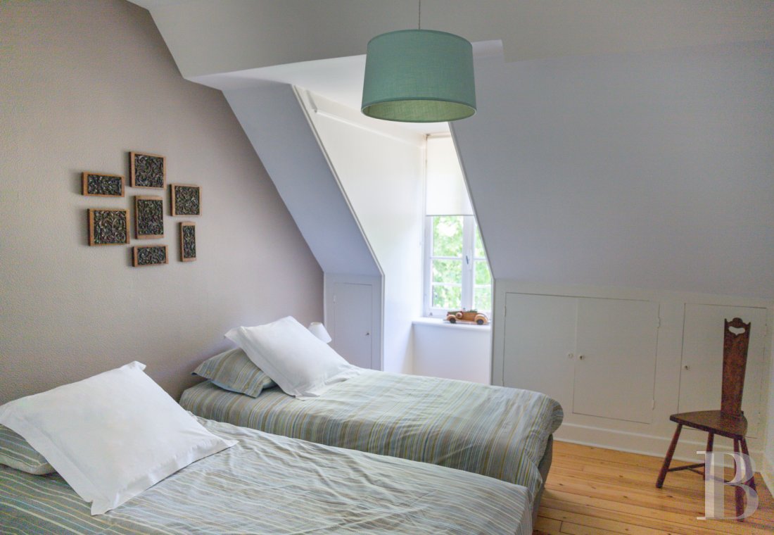 A manor house surrounded parkland and crossed by the River Sauldre in Romorantin, in the Sologne region - photo  n°22