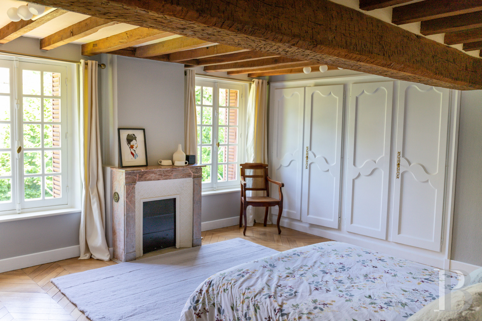 A manor house surrounded parkland and crossed by the River Sauldre in Romorantin, in the Sologne region - photo  n°16