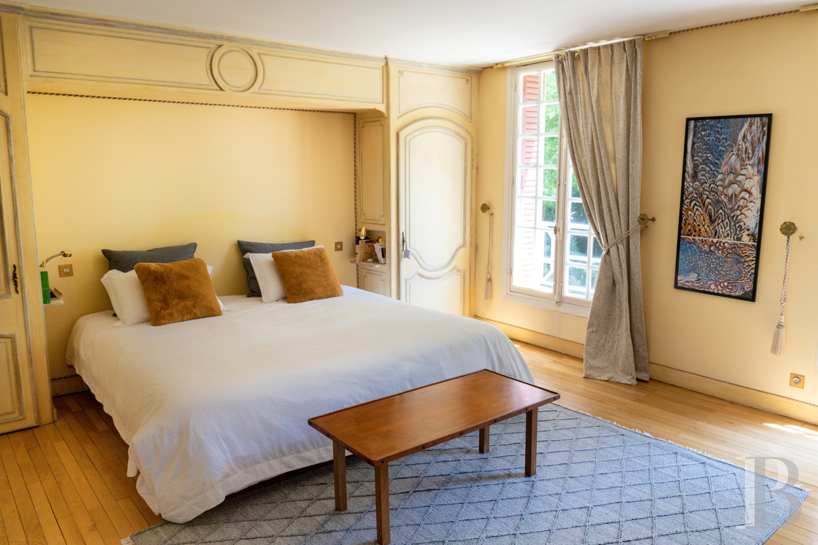 A manor house surrounded parkland and crossed by the River Sauldre in Romorantin, in the Sologne region - photo  n°13