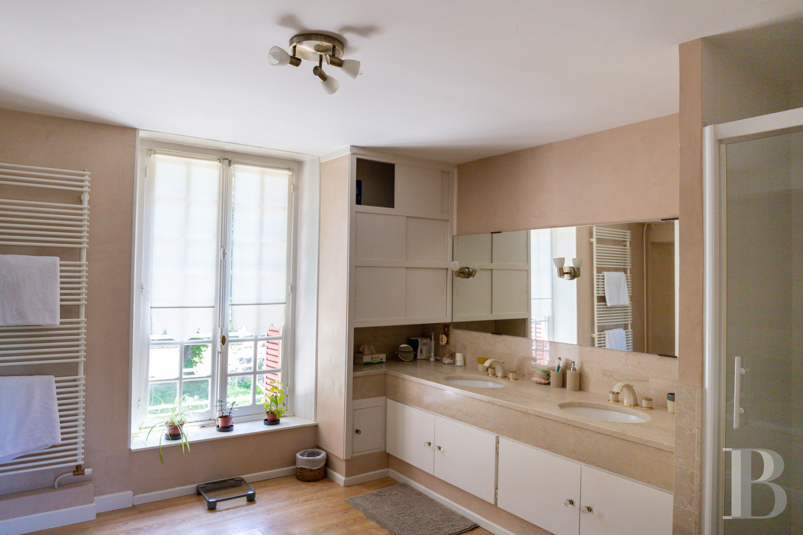 A manor house surrounded parkland and crossed by the River Sauldre in Romorantin, in the Sologne region - photo  n°17