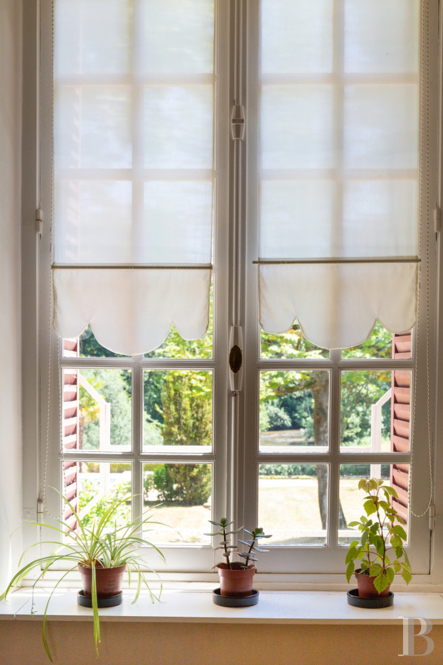 A manor house surrounded parkland and crossed by the River Sauldre in Romorantin, in the Sologne region - photo  n°18