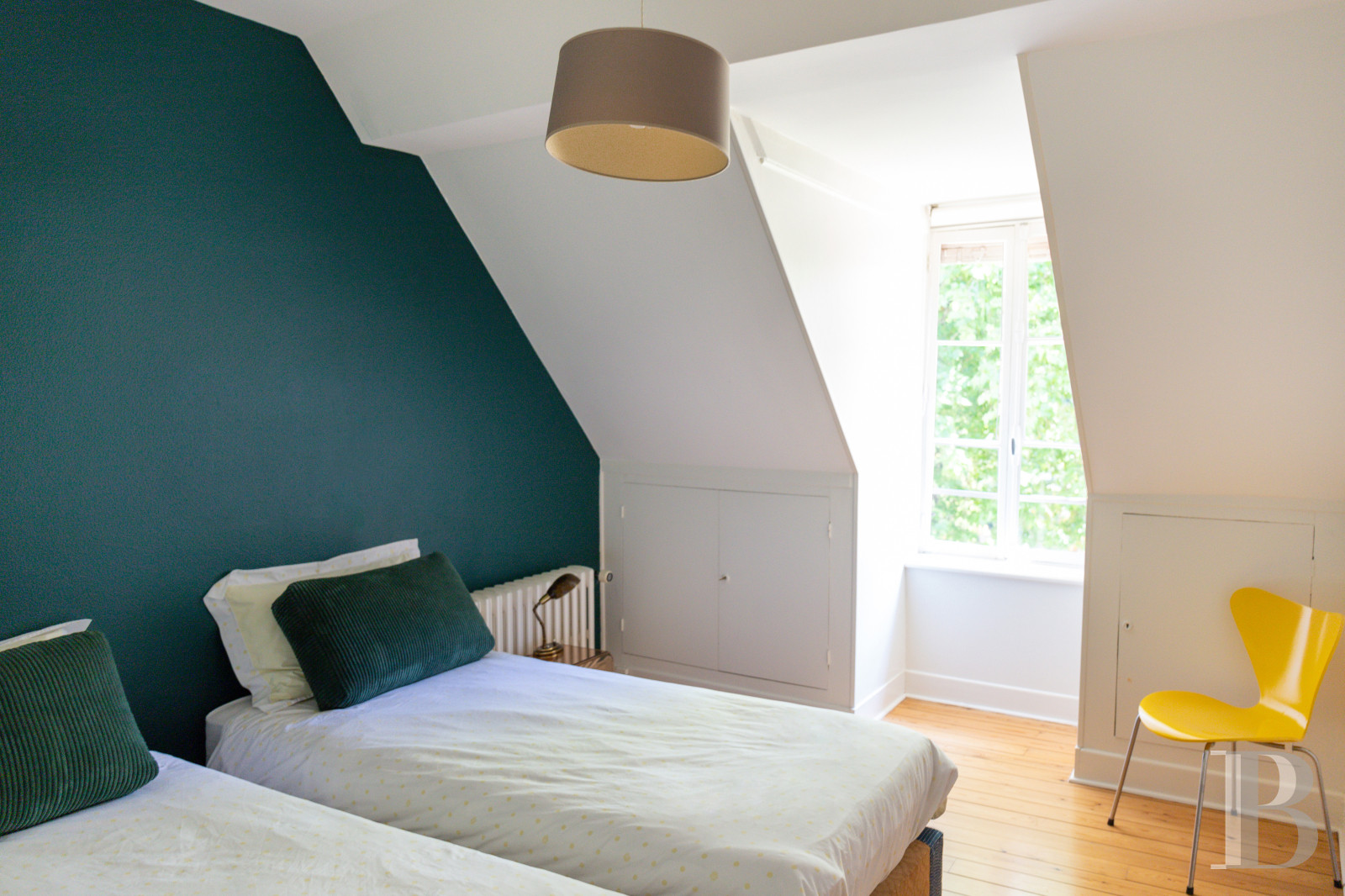 A manor house surrounded parkland and crossed by the River Sauldre in Romorantin, in the Sologne region - photo  n°23