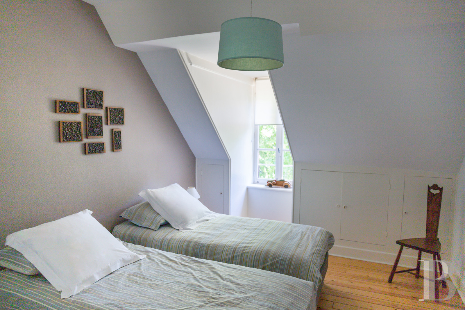 A manor house surrounded parkland and crossed by the River Sauldre in Romorantin, in the Sologne region - photo  n°22