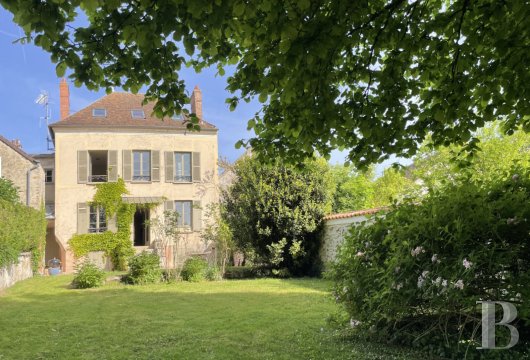 ile-de-france - A 19th-century house and 1,700-m² gardens with river and forest access,  forty minutes southeast of Paris, in a 15th-century seigniorial village