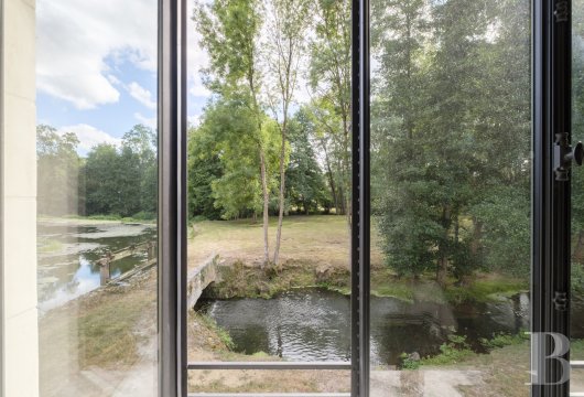 An old mill and miller's house beside a river near Argenton-sur-Creuse in the Indre department  - photo  n°16