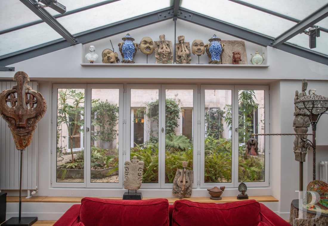 A vast apartment set around a garden in Paris, between Boulevard Saint-Germain and the Seine - photo  n°1
