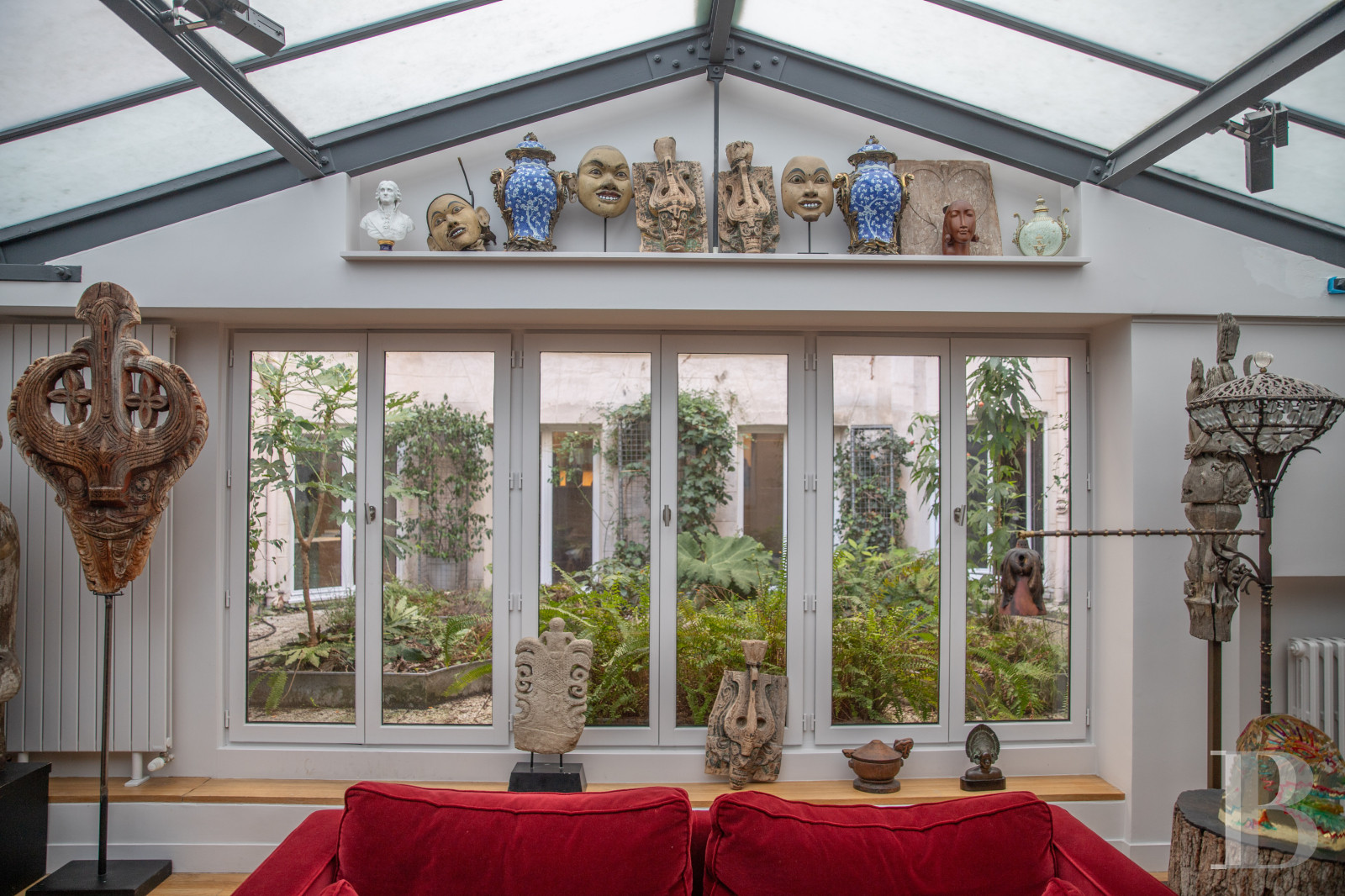 A vast apartment set around a garden in Paris, between Boulevard Saint-Germain and the Seine - photo  n°1