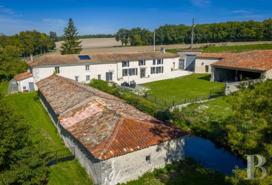 poitou-charentes - A house with a 16th-century mill with full ownership rights and outbuildings, in 5-hectare grounds, in the brightness of the Charente area as described by writer Jacques Chardonne