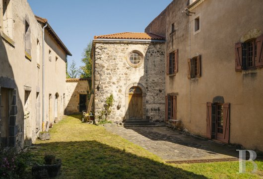 auvergne - A former 18th-century monastery and its garden,  in the fortified village of Mareugheol, within the Puy-de-Dôme department