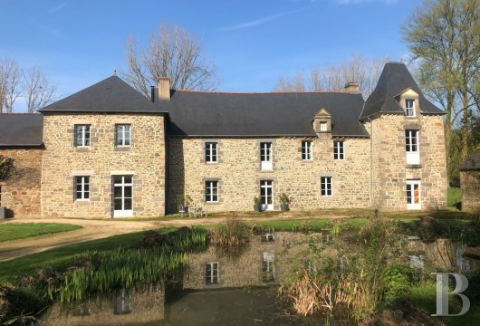 bretagne - À 20 min de Rennes, au bord de son étang privé, un vaste manoir rénové avec piscine et dépendances
