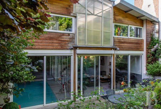 ile-de-france - A 255-m² loft with an indoor swimming pool and garden,  behind an understated façade near downtown Colombes