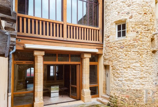 rhones-alps - A renovated 14th-century dwelling with an interior courtyard and  medieval tower, in the middle of a historical Brionnais city, in the south of Burgundy