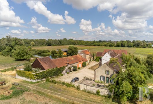 burgundy - A former watermill from the 19th century with a farm complex and 25 hectares of land

 free of any use or buildings, nestled on the River Armançon in France’s Yonne department