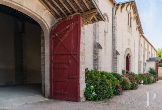 center-val-de-loire - An impressive group of 19th-century farm buildings with a manor  house around a square courtyard, in the north of the Loiret department