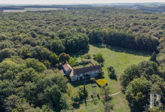 ile-de-france - A former farmhouse in a forest clearing, surrounded by woods and meadows, with 29 hectares of grounds, 45 minutes west of Paris near the town of Mézières-sur-Seine